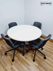 Large Round Meeting Table with Four Orangebox Chairs