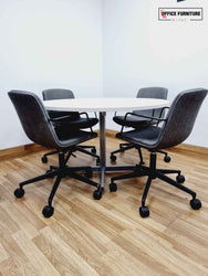 Large Round Meeting Table with Four Orangebox Chairs