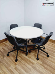 Large Round Meeting Table with Four Orangebox Chairs