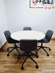 Large Round Meeting Table with Four Orangebox Chairs